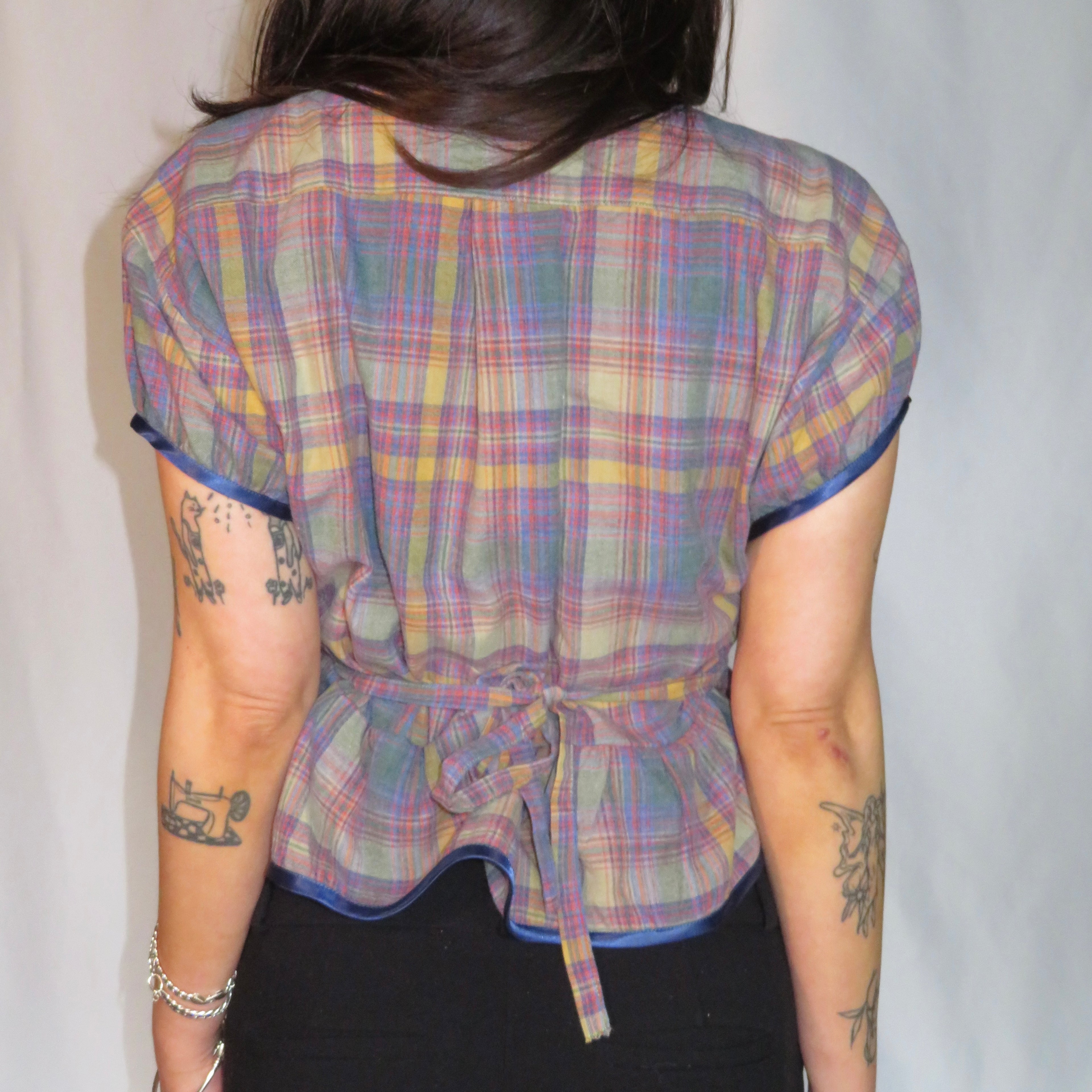Arrow Ruffle Tie-Back Blouse